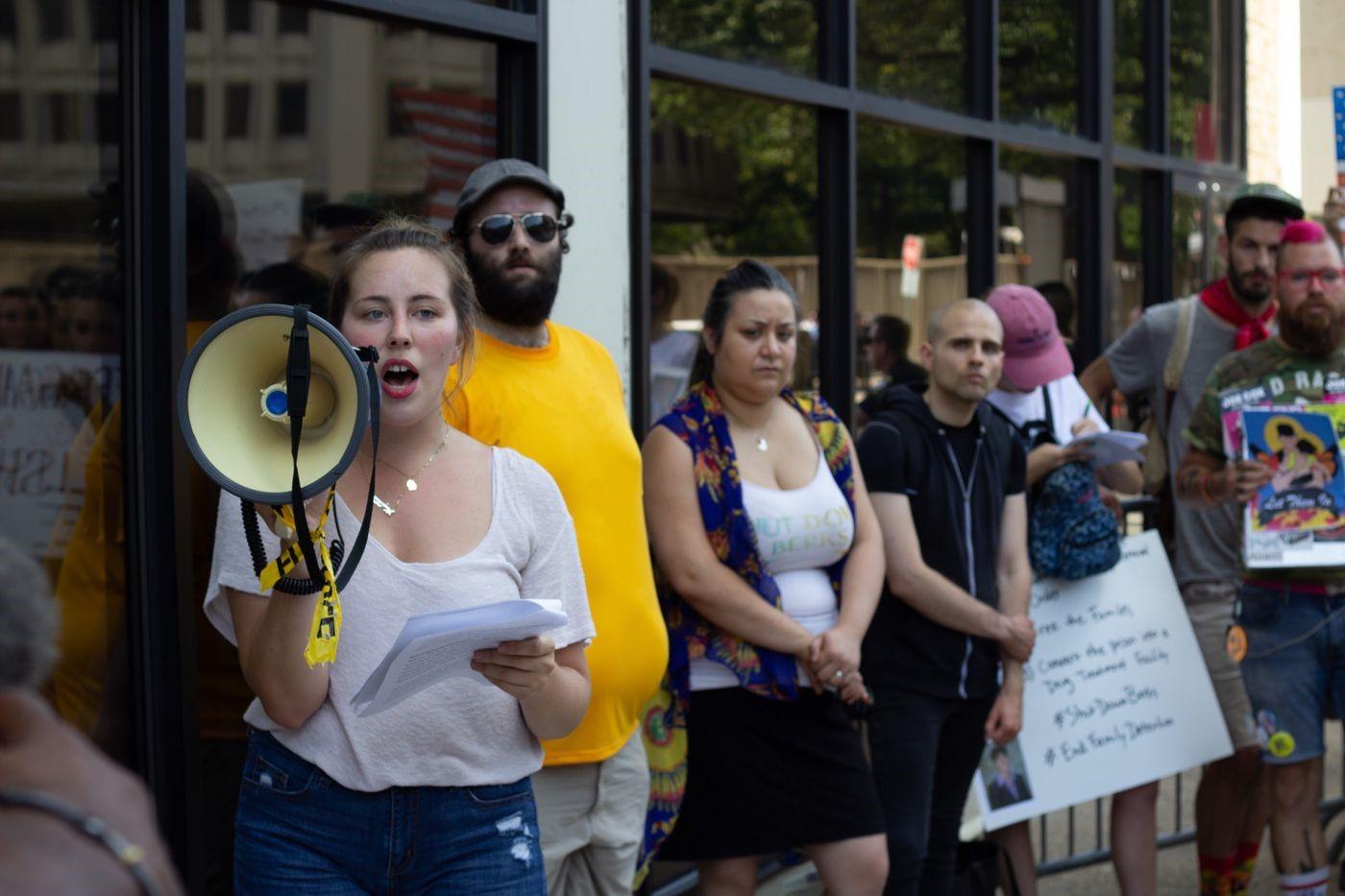RRC student Lizzie Horne (left, with megaphone) leads a protest against border detention camps for Never Again Action in Center City on July 4, 2019.