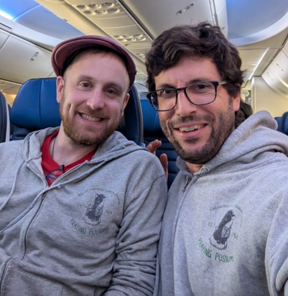 Rabbi Alex Weissman and Rabbi Micah Weiss on a plane together